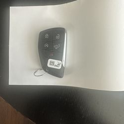 Original 2023 Chevy Silverado car key and owner manual