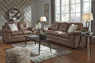 New Ashley sofa and love seat at wholesale Furniture Center 25 w 39th street Kansas City mo 64111