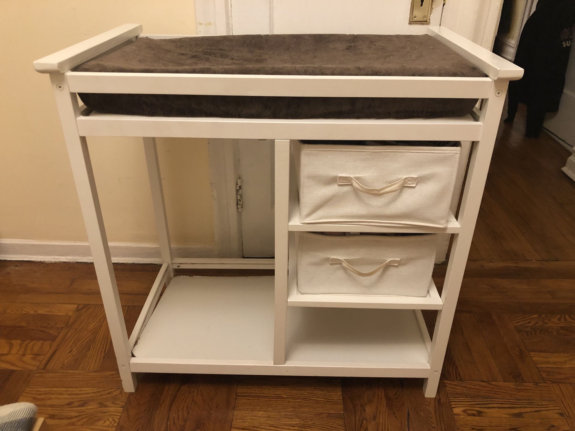Baby changing table with pad and covers