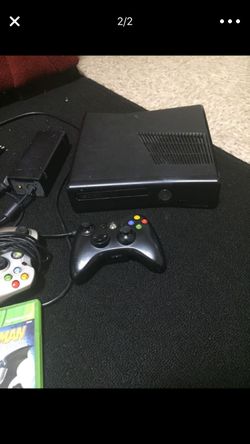 Xbox 360 with 3 games and 2 controllers and All the cords come with it