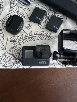 GoPro HERO 7 Black Action Camera with Accessories and Batteries