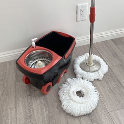 $25 (New) Deluxe black spin mop wheels and extended handle with 2x microfiber mop heads 