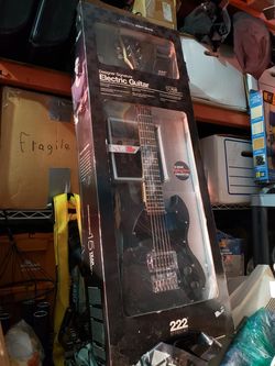 Electric guitar M.I.B. Still Available As Of 11/26/21