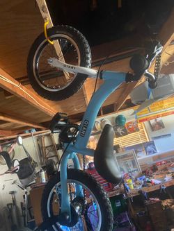 Strider bike w training wheels and peddles