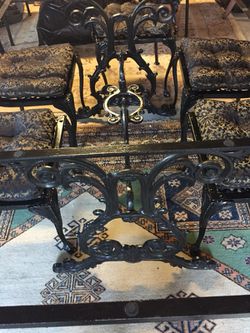 Wrought iron table and chairs.