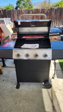 Expert Grill 4-Burner Propane Gas Grill features a stainless steel lid (se hable español)