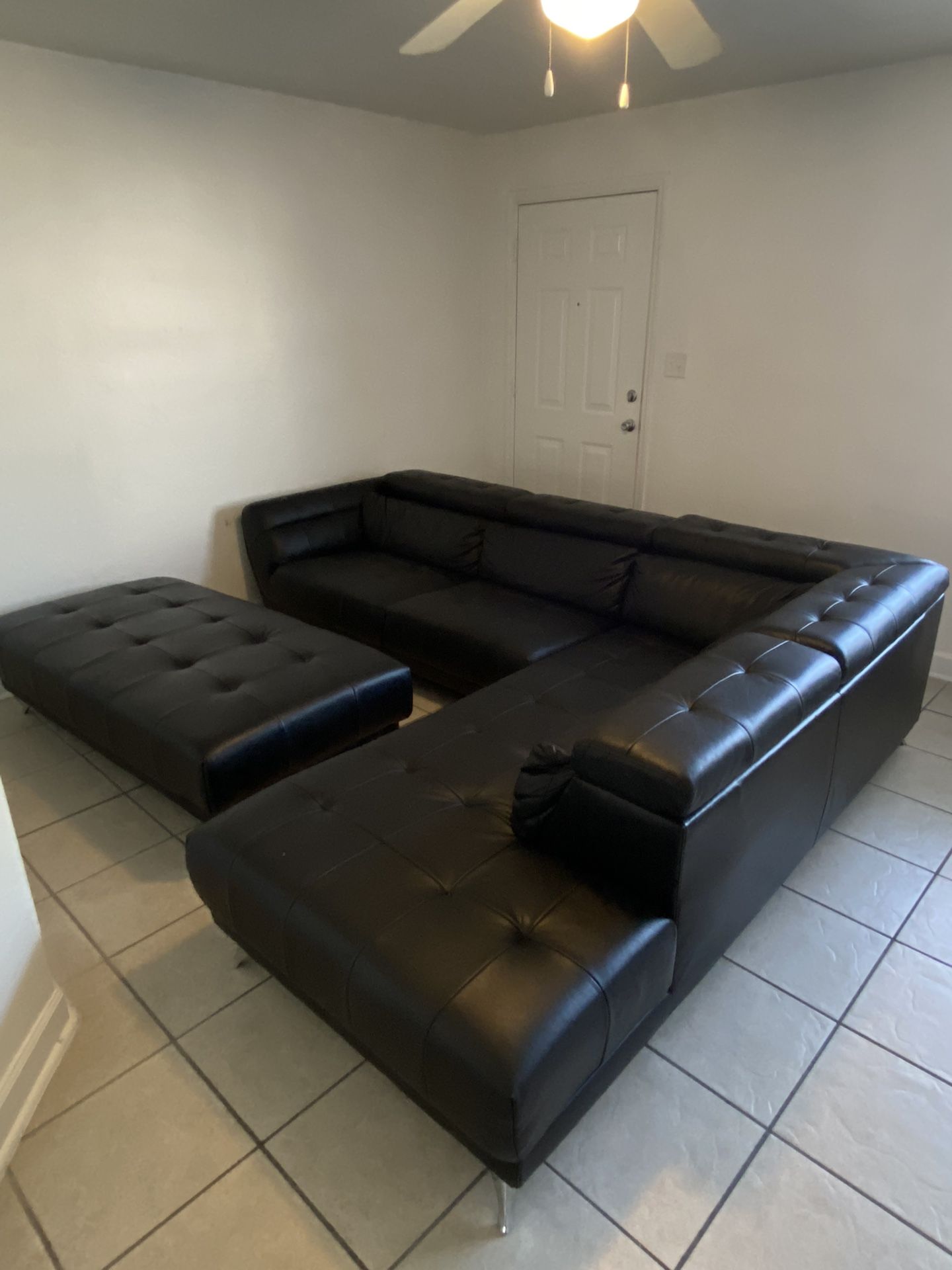 Black Leather L-Shaped Couch With Island