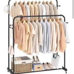brand new never used clothibg rack 