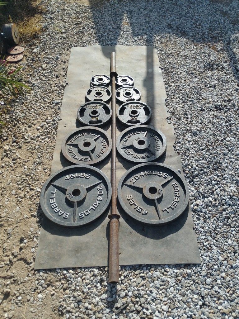 Olympic Weights 240lbs + Bar