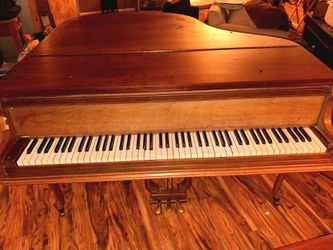 Postings baby grand piano for a read
