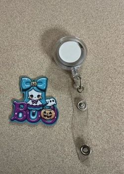 New Girl Ghost with pumpkin as O Retractable ID Badge holder