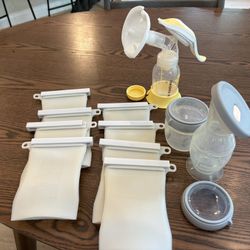 Breastfeeding supplies- Haaka, Hand Pump, Milk Storage Bags