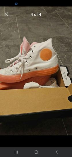 Pink/white size 7 Chuck Taylors