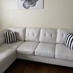 Heights White Faux Leather Reversible Sectional with Storage Ottoman