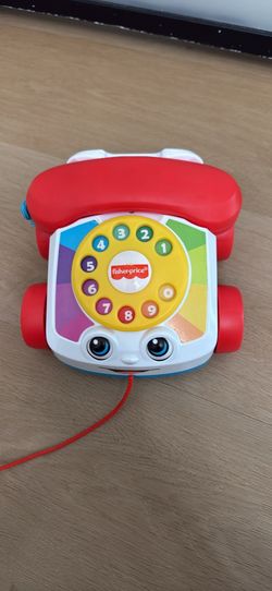 Pull along telephone toy