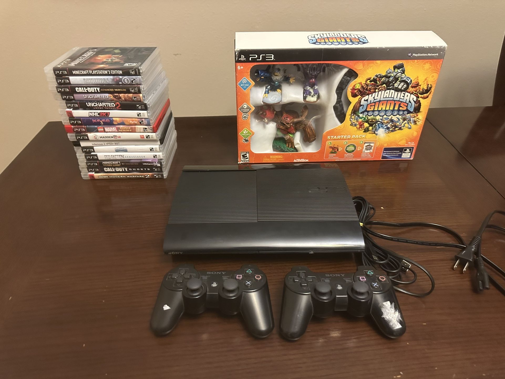 PS3 Slim 500GB Console With 16 Games 