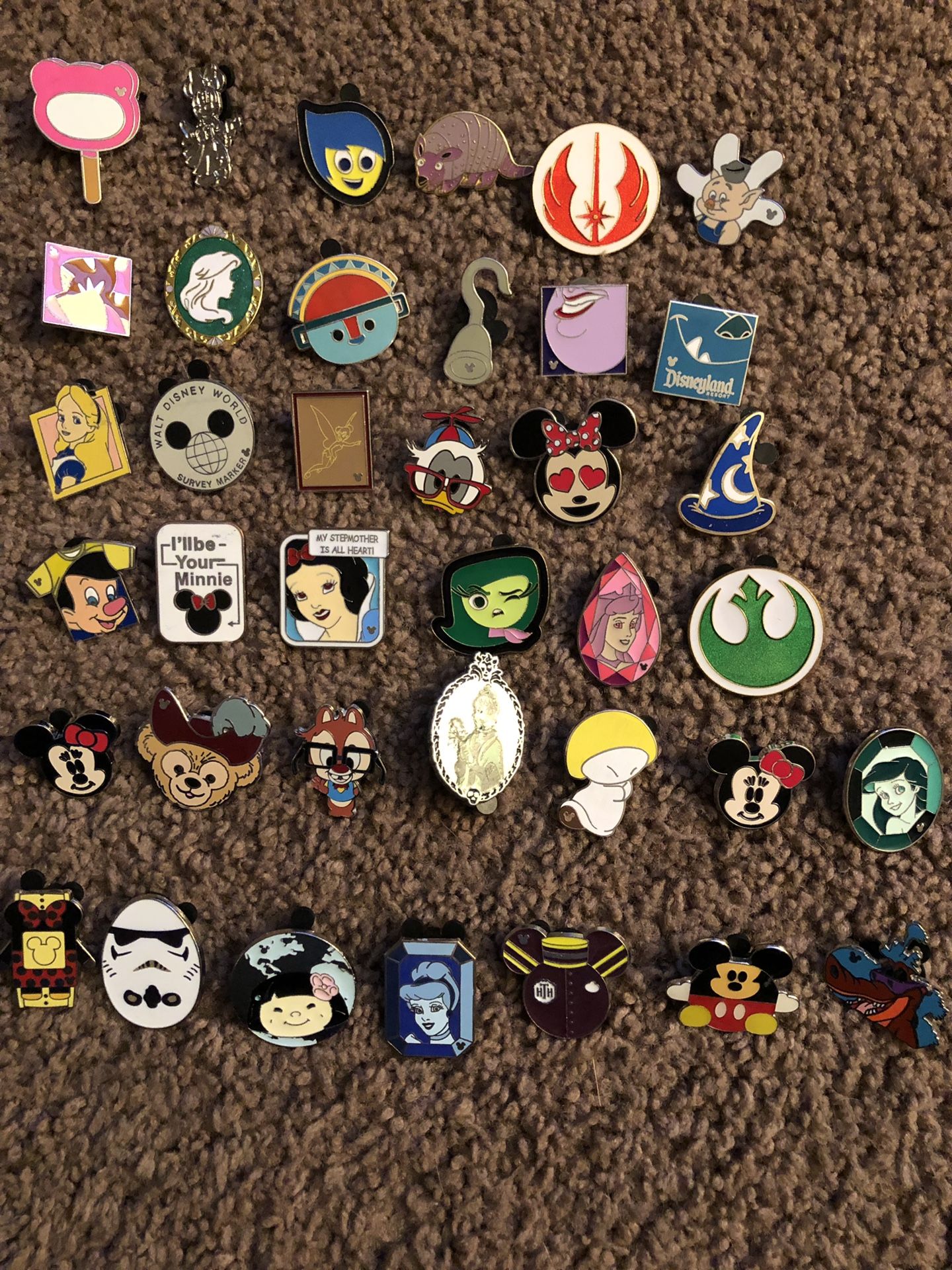Disney character Disney pins. All of them were traded at Disneyland and Disneyland California by my KIDS. They are not actual collectors so I can’t