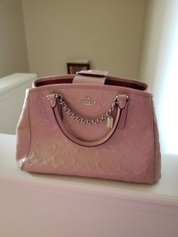 Like new coach purse with box it's real