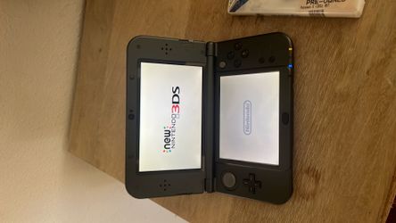 New Nintendo 3DS XL + games + charger
