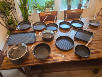 15 pieces of All Clad cookware