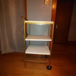 Gold and white bar cart