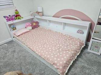 Twin floor bed