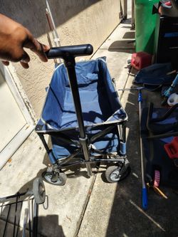 Portal big wheel folding wagon (MAKE OFFER NOT FIRM ON PRICE) ITS MINE SO MAKE OFFERS