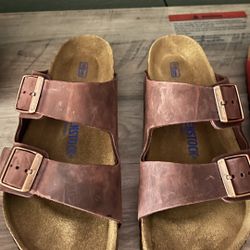 Birkenstock.   Brown Size 40.    Red Size 42