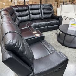 Black living room sectional with cupholder