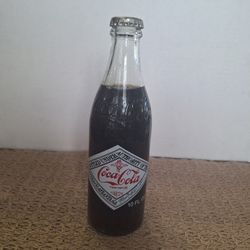 75th COCA-COLA COMMEMORATIVE BOTTLE