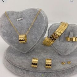 Gold L😍v set earrings ring Size 8 bracelets and chain 