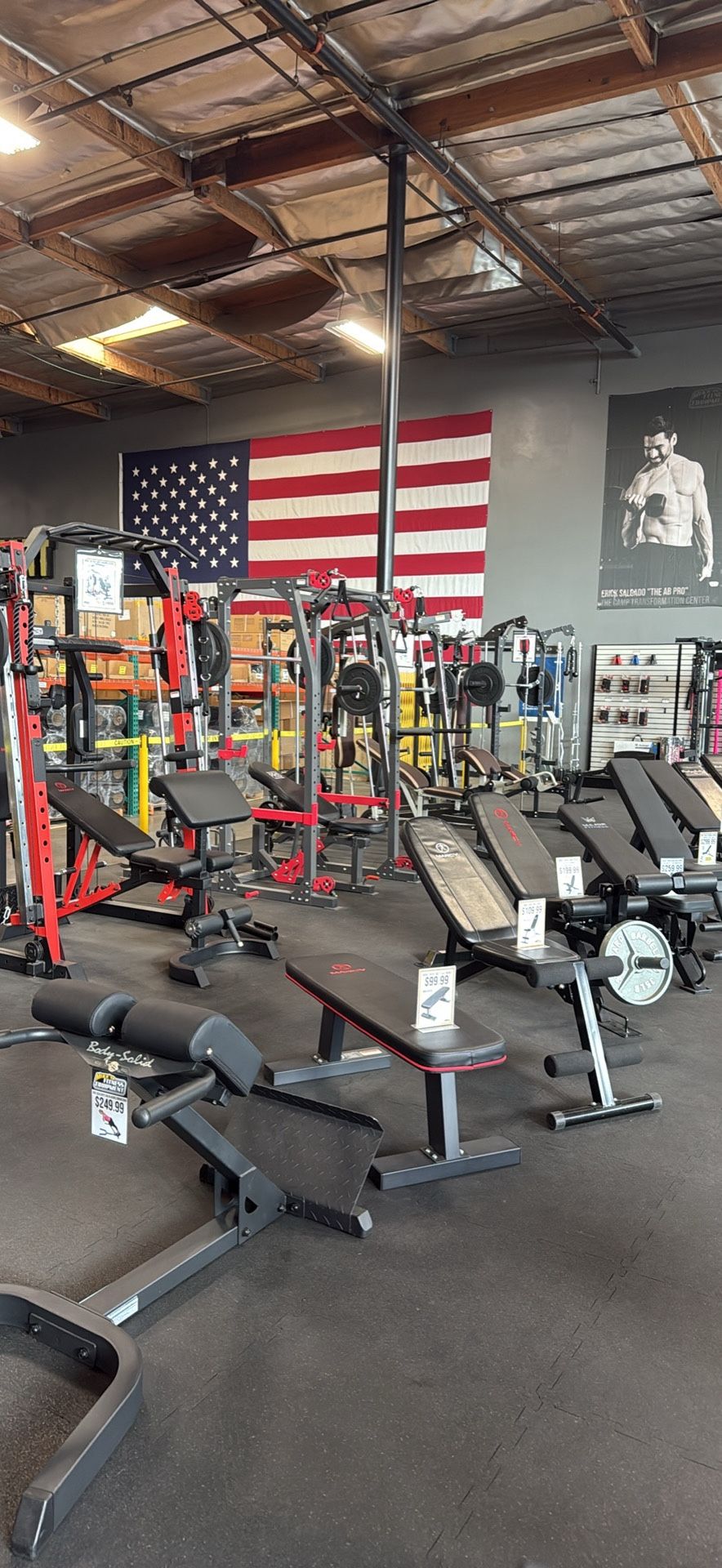 Olympic Adjustable Bench – Smith Machine – Squat Rack – Rubber Flooring – Dumbbells – Weights – Bumper Plates – Bar