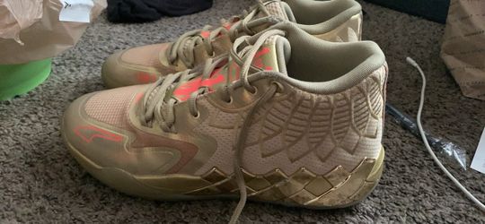 gold melos basketball shoes (size 11.5) men