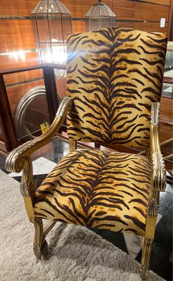 Zebra patterned arm chair