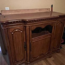 Solid Wood Entertainment Center With Recessed TV That Raise Up And Out of It. 
