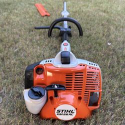 STIHL KombiMotor KM 56 RC-E Gas Multi-System Power Head With A Hedge Trimmer Attachment 