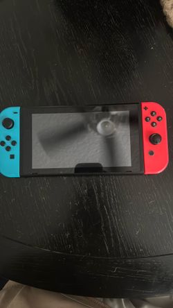 Nintendo switch with games and charger