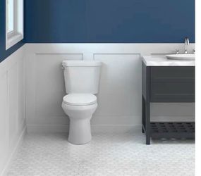 12 in. Rough In 2-Piece 1.28 GPF Single Flush Round Toilet in White, Seat Included