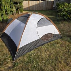 Compact lightweight backpacking  or motorcycle tent with mummy bag, blanket, and pillow 
