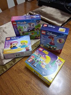 Four Lego Sets  new in box unopened