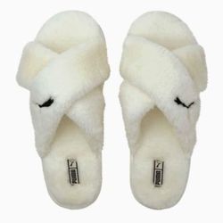 Brand new white fluffy Puma slides size 11 for Sale in Daytona Beach FL OfferUp