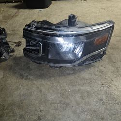 2013 Ford Flex Headlight assembly.
