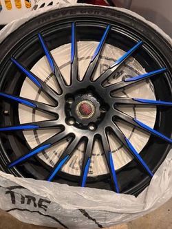 Blue Rims and Tires - $800