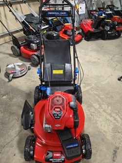 Toro personal pace SmartStow Self-Propelled with power reverse 
163cc Briggs Engine 
Fully serviced 
Bag. Side discharge.  Mulching 
$349