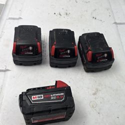 set 4 Milwaukee M18 Red Lithium XC 5.0 Compact Battery Pack 