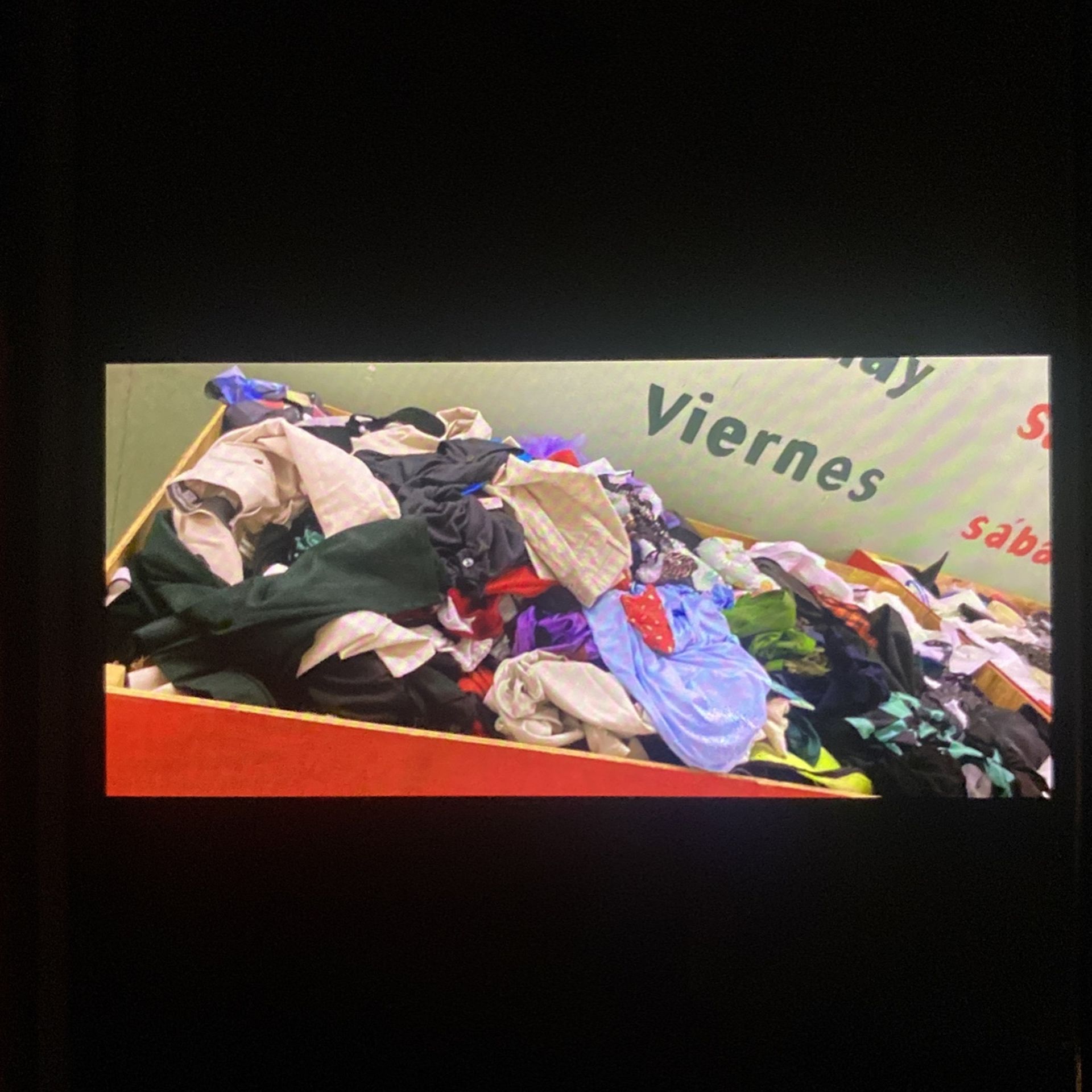 Table Full Of Mixed New Stuff And Clothes