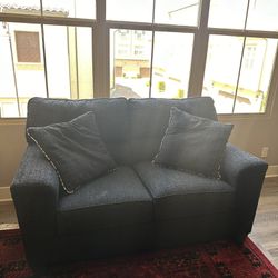 $150 Bob’s Furniture Store Black Love Couch (2 Seater) 37inW x 60in L x 39xH