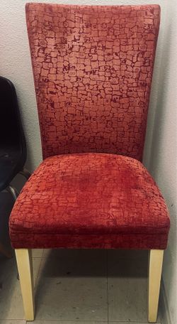 A Set of 4 Colored Upholstery Dining chairs.