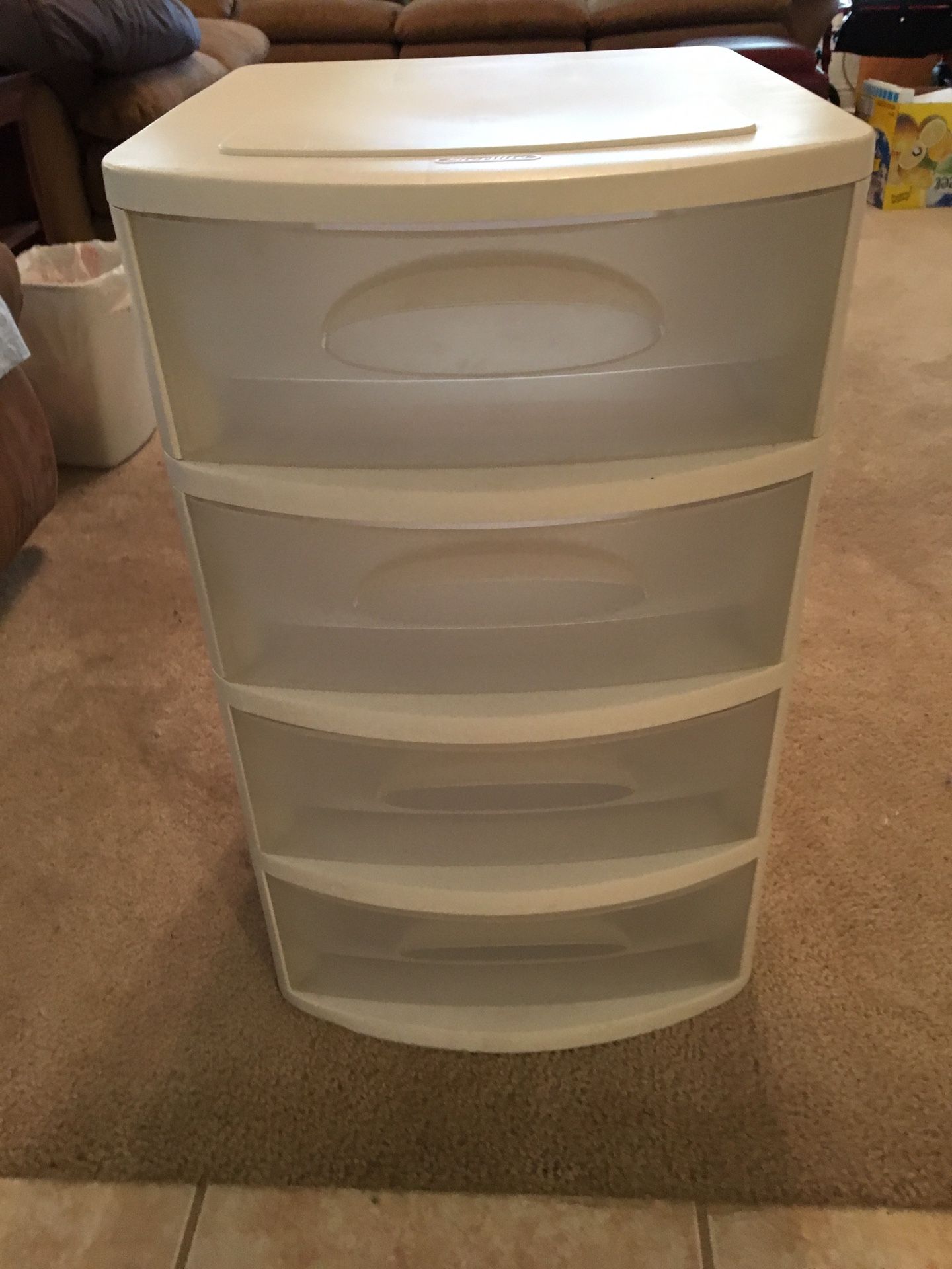 Plastic container for storage with 4 wheels and 4 drawers