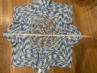 Beautiful blues and white hand crocheted round cloth, can drape over table, could make into a large pillow, could incorporate onto a comforter, lots